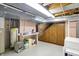 Utility area with a work bench and water heater at 10036 E Troy Ave, Indianapolis, IN 46239