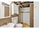 Basement bathroom featuring a stand up shower, toilet, and vanity at 10036 E Troy Ave, Indianapolis, IN 46239