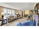 Comfortable living room area with ample natural light and warm colors at 10036 E Troy Ave, Indianapolis, IN 46239