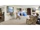 Spacious living room featuring a fireplace and comfortable seating at 10036 E Troy Ave, Indianapolis, IN 46239