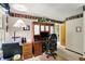 Bright office space featuring custom built-in shelving and ample natural light, perfect for a productive workspace at 10036 E Troy Ave, Indianapolis, IN 46239