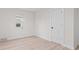 Spare bedroom with hardwood floors and a single window at 1108 N Ritter Ave, Indianapolis, IN 46219