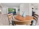 Dining area adjacent to the living room and kitchen features natural light at 1108 N Ritter Ave, Indianapolis, IN 46219