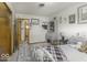 Cozy bedroom featuring a white metal bedframe and a lovely gray patterned rug at 1190 W Jefferson St, Franklin, IN 46131