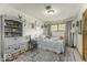 Charming bedroom featuring a single bed, decorative shelves, and cozy decor at 1190 W Jefferson St, Franklin, IN 46131