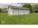 A spacious three-car garage offers plenty of room for vehicles and storage at 1190 W Jefferson St, Franklin, IN 46131
