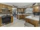 Warm kitchen featuring wood cabinets and modern appliances at 1190 W Jefferson St, Franklin, IN 46131