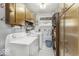 Bright laundry room with washer, dryer, and plenty of cabinet space at 1190 W Jefferson St, Franklin, IN 46131