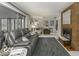 Spacious living room with brick fireplace and comfortable leather seating at 1190 W Jefferson St, Franklin, IN 46131
