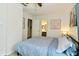 Bright bedroom with a ceiling fan and ensuite bath at 1236 Central Ave, Indianapolis, IN 46202
