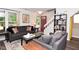 Inviting living room featuring stylish sofas and a convenient side table at 1236 Central Ave, Indianapolis, IN 46202