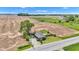 Aerial view of the home on a large lot with surrounding farmland at 1237 W State Rd 38, Pendleton, IN 46064
