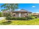 Charming bungalow home with a covered porch and well-maintained lawn at 1237 W State Rd 38, Pendleton, IN 46064