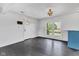 Bright living room featuring hardwood floors, fresh paint, and updated lighting at 1237 W State Rd 38, Pendleton, IN 46064