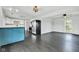 Open-concept living area with modern finishes and dark wood floors at 1237 W State Rd 38, Pendleton, IN 46064