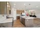 Modern kitchen with quartz countertops, stainless steel appliances, and ample cabinet space at 1270 Shaw Ln, Shelbyville, IN 46176