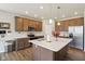 Spacious kitchen with an island, stainless steel appliances, and plenty of storage at 1270 Shaw Ln, Shelbyville, IN 46176