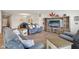 Comfortable living room with wood floors provides ample seating for relaxing and entertaining at 1270 Shaw Ln, Shelbyville, IN 46176
