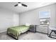 Bedroom with bed, desk, and storage; natural light from the window at 12832 Broncos Dr, Fishers, IN 46037