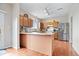 Functional kitchen with stainless steel appliances, a center island, and ample cabinet space for storage at 12832 Broncos Dr, Fishers, IN 46037