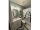 Playful bathroom design with a shark-themed shower curtain and bright lighting at 1304 Crescent Dr, Greenwood, IN 46143