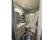 Bathroom with tub, shower and vanity with sink, mirror, lighting and nautical rug at 1304 Crescent Dr, Greenwood, IN 46143