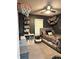 Fun bedroom with unique wall decor, playful accents, and cozy carpeting at 1304 Crescent Dr, Greenwood, IN 46143