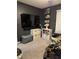 Cozy bedroom with storage solutions, dark walls and carpeting, and entertainment area at 1304 Crescent Dr, Greenwood, IN 46143