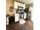 Bright kitchen with white cabinets, stainless steel appliances, and hardwood floors at 1304 Crescent Dr, Greenwood, IN 46143