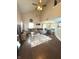 Bright living room features vaulted ceilings, hardwood floors, and a comfortable seating area at 1304 Crescent Dr, Greenwood, IN 46143