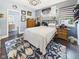 Bedroom with hardwood floors, neutral color scheme, and walk-in closet at 1409 Spann Ave, Indianapolis, IN 46203