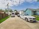 Long driveway leads up to the home with ample parking space for multiple vehicles at 1409 Spann Ave, Indianapolis, IN 46203
