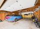 Spacious garage featuring a blue convertible car and ample storage solutions at 1409 Spann Ave, Indianapolis, IN 46203