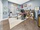 Spacious home office with hardwood floors, a large window, custom shelving, and ample space for productivity at 1409 Spann Ave, Indianapolis, IN 46203