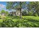 A backyard with a mature tree at 1515 S Emerson Ave, Indianapolis, IN 46203
