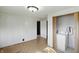 Bedroom with linoleum floors and laundry area at 1515 S Emerson Ave, Indianapolis, IN 46203