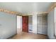 Spare bedroom with linoleum floors and closet at 1515 S Emerson Ave, Indianapolis, IN 46203