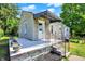 Charming single-story home with stone facade, covered entryway, and landscaped front yard at 1515 S Emerson Ave, Indianapolis, IN 46203