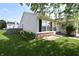 Side view of house with charming lawn and flowerbed at 1652 Sweetwater Ln, Greenfield, IN 46140