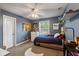 This bedroom has a cozy carpet, a ceiling fan, a window with blinds, and ample space for relaxation at 17002 Folly Brook Rd, Noblesville, IN 46060