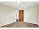 Bedroom featuring a closet, neutral walls and carpet flooring at 1852 N Warman Ave, Indianapolis, IN 46222