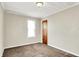 Bedroom with natural light, neutral walls and carpet at 1852 N Warman Ave, Indianapolis, IN 46222