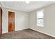 Bright bedroom featuring natural light, neutral walls and carpet flooring at 1852 N Warman Ave, Indianapolis, IN 46222