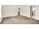 A large living room with wall-to-wall carpet at 1852 N Warman Ave, Indianapolis, IN 46222