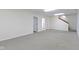 Spacious basement featuring neutral carpeting, painted walls, and staircase at 1941 Orchard Ct, Carmel, IN 46280