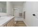 Bathroom featuring a vanity, toilet and shower with glass doors at 1941 Orchard Ct, Carmel, IN 46280