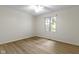 Empty bedroom featuring a ceiling fan and laminate flooring at 1941 Orchard Ct, Carmel, IN 46280