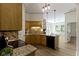 Cozy kitchen featuring granite countertops, stainless steel appliances, and charming tile backsplash at 1941 Orchard Ct, Carmel, IN 46280