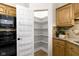 Kitchen pantry with shelving at 1941 Orchard Ct, Carmel, IN 46280