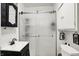 This bathroom features a walk-in shower, vanity, and a toilet at 2150 S Emerson Ave, Indianapolis, IN 46203